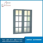 Hliníková garážová vrata ve francouzském venkovském stylu